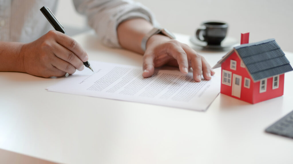Person signing a lease agreement that represents a contract of adhesion